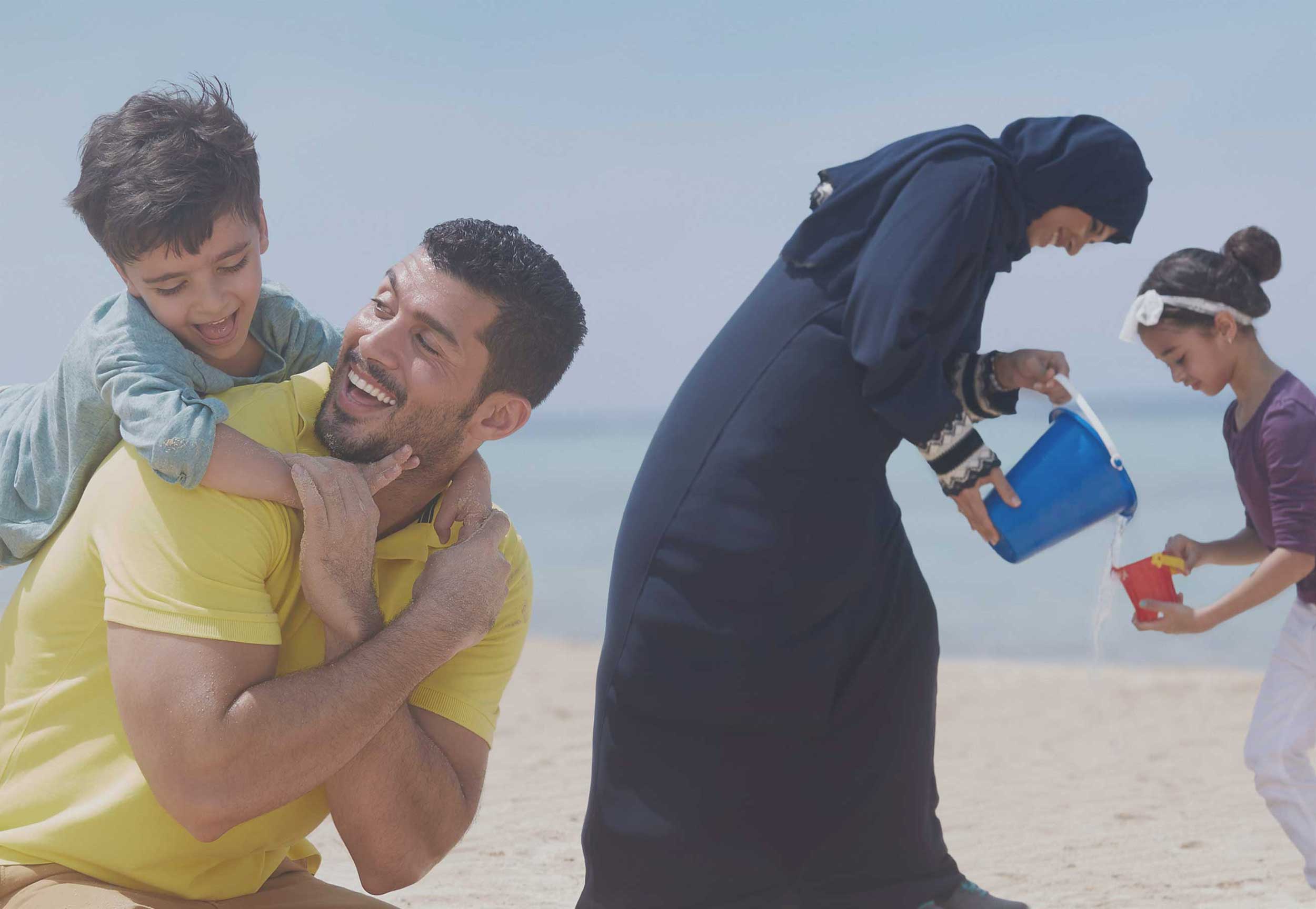 Happy family representing Bupa Arabia’s Aramco Family health insurance plan
