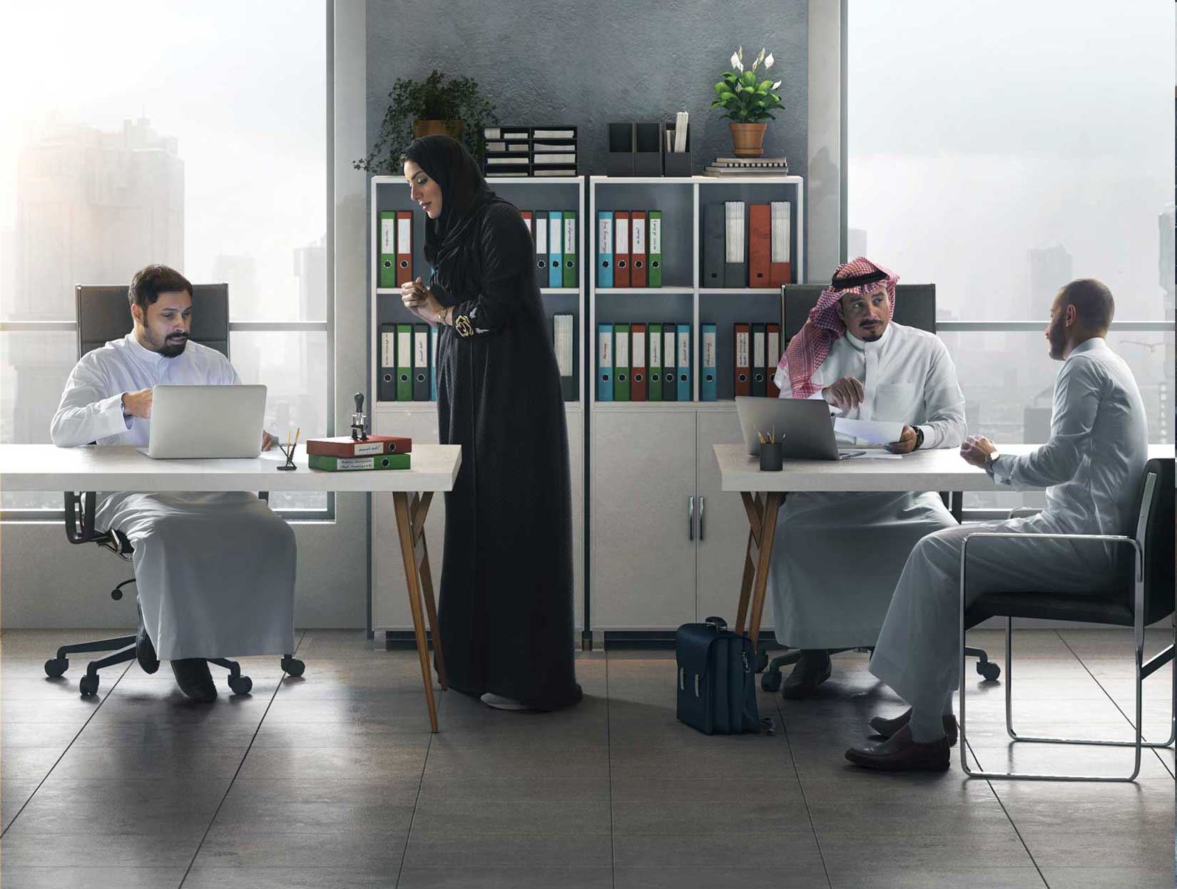 Small business owners discussing health insurance solutions by Bupa Arabia