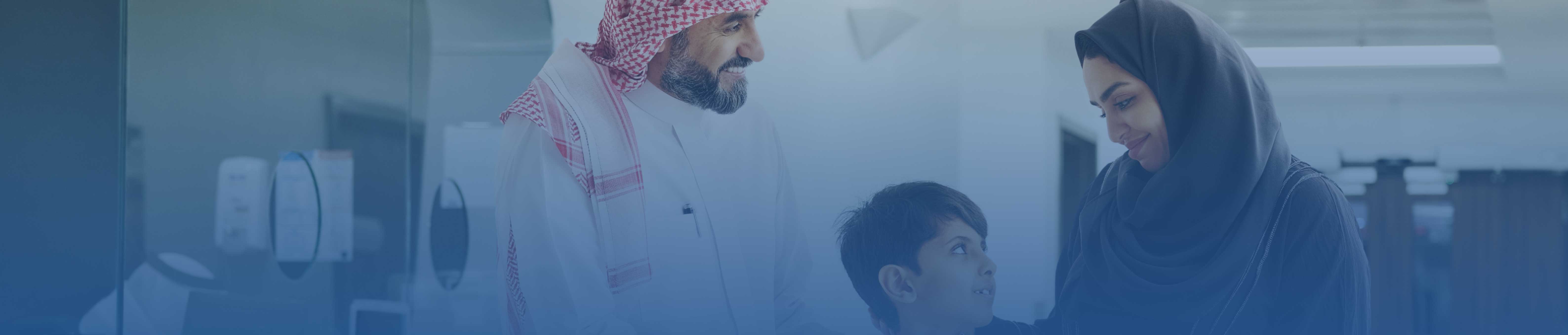 Smiling family promoting comprehensive health coverage by Bupa Arabia